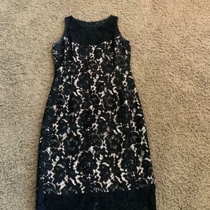 Black lace dress with nude lining.